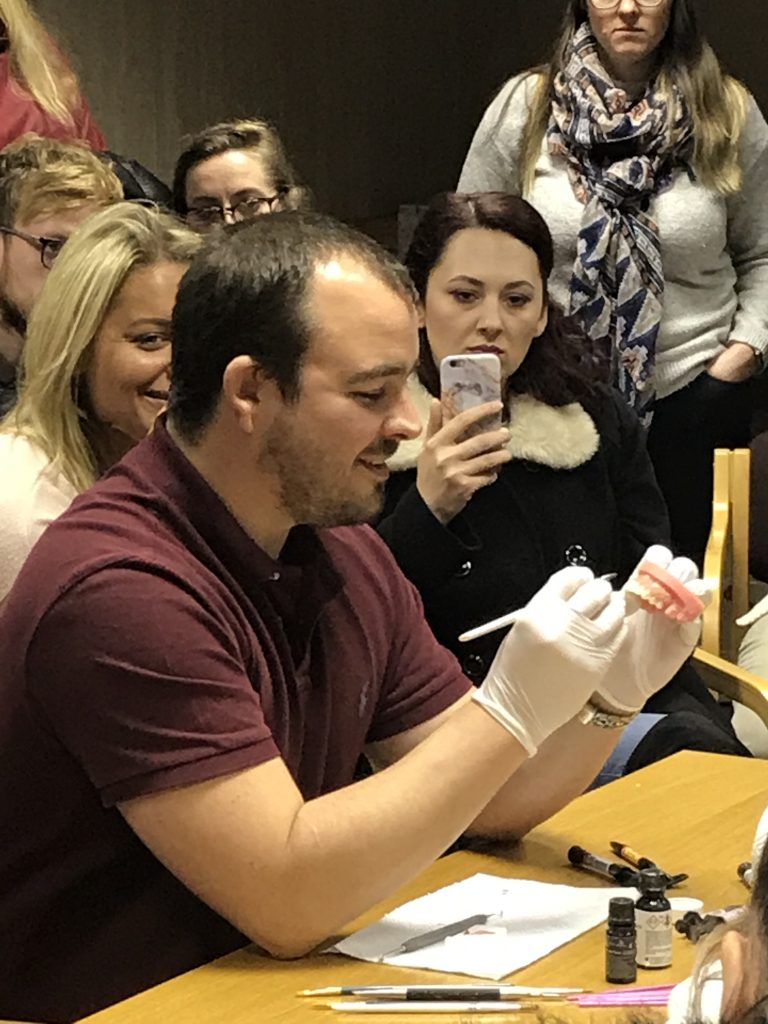 Chris Wibberly demonstrating dental product